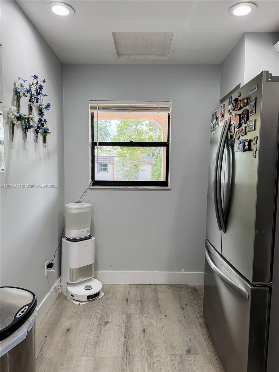 841 Northeast 207th Lane, Unit 3204 Miami, FL 33179 - Photo 18 of 37 a view of a livingroom with furniture and a window
