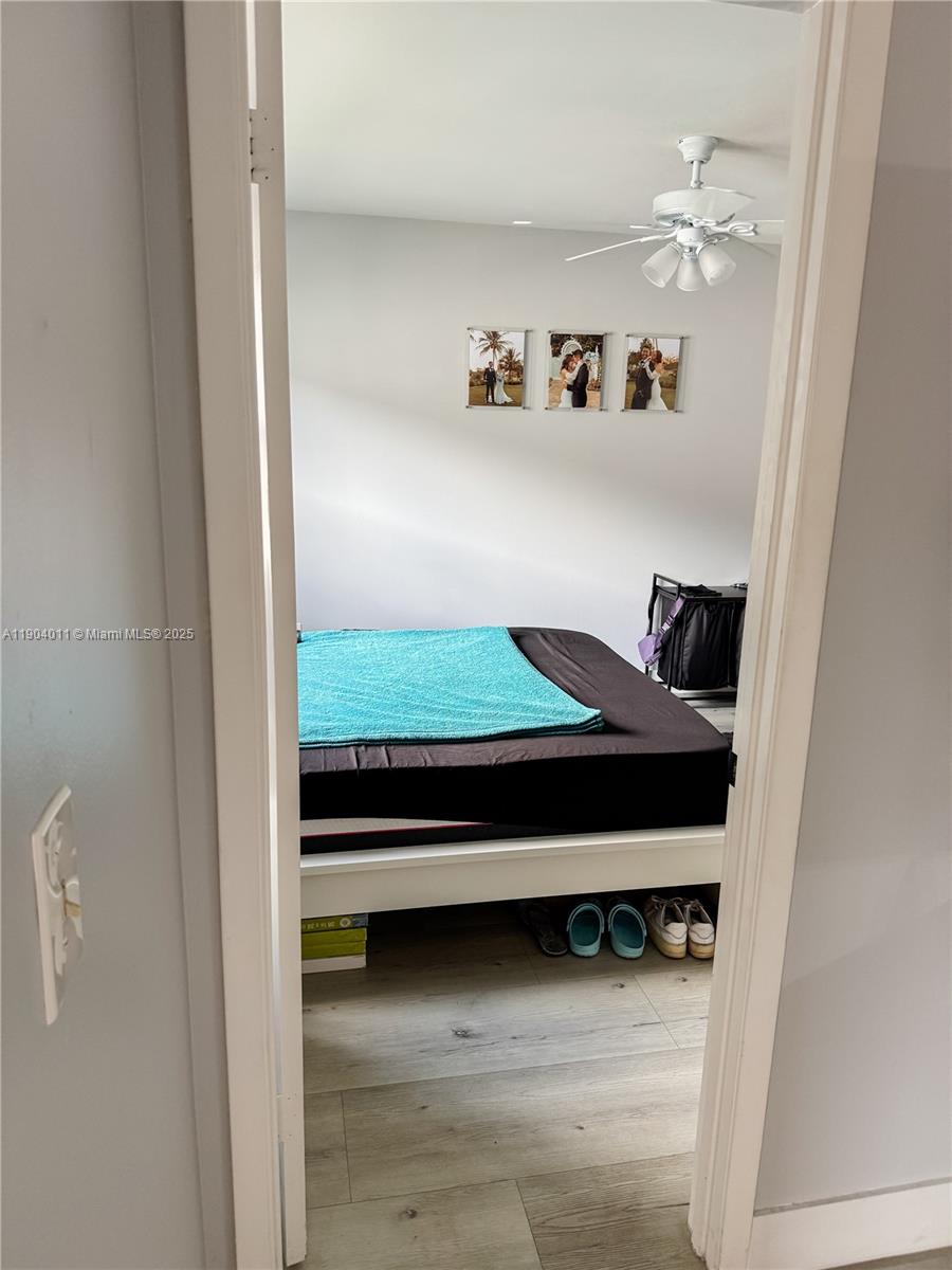 841 Northeast 207th Lane, Unit 3204 Miami, FL 33179 - Photo 24 of 37 a room with stairs