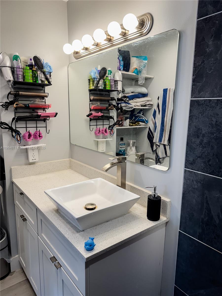 841 Northeast 207th Lane, Unit 3204 Miami, FL 33179 - Photo 28 of 37 a room with storage and utility