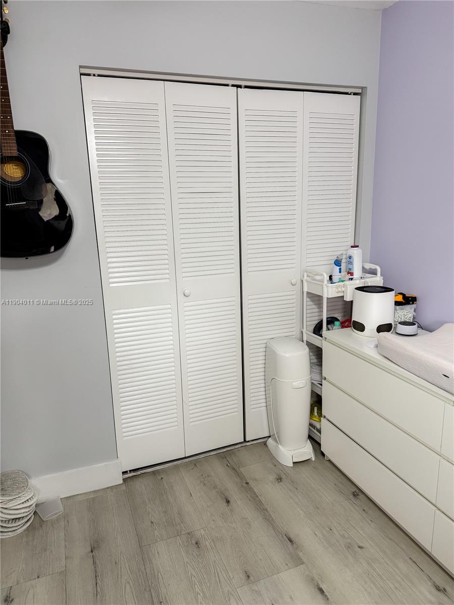 841 Northeast 207th Lane, Unit 3204 Miami, FL 33179 - Photo 10 of 37 a bathroom with a sink a toilet and shower