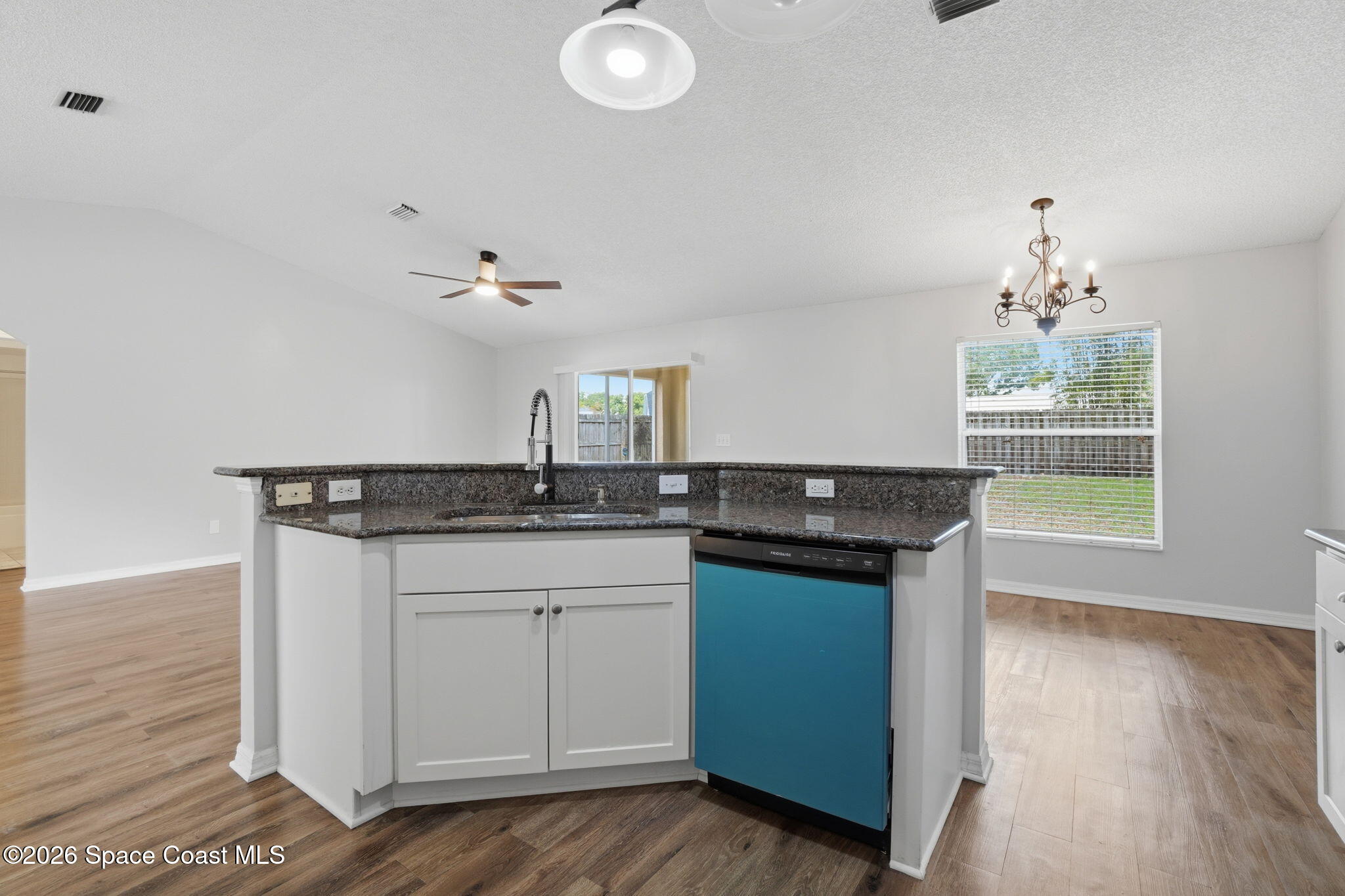 2005 Lansing Street Melbourne, FL 32935 - Photo 19 of 47 a kitchen with a sink and cabinets