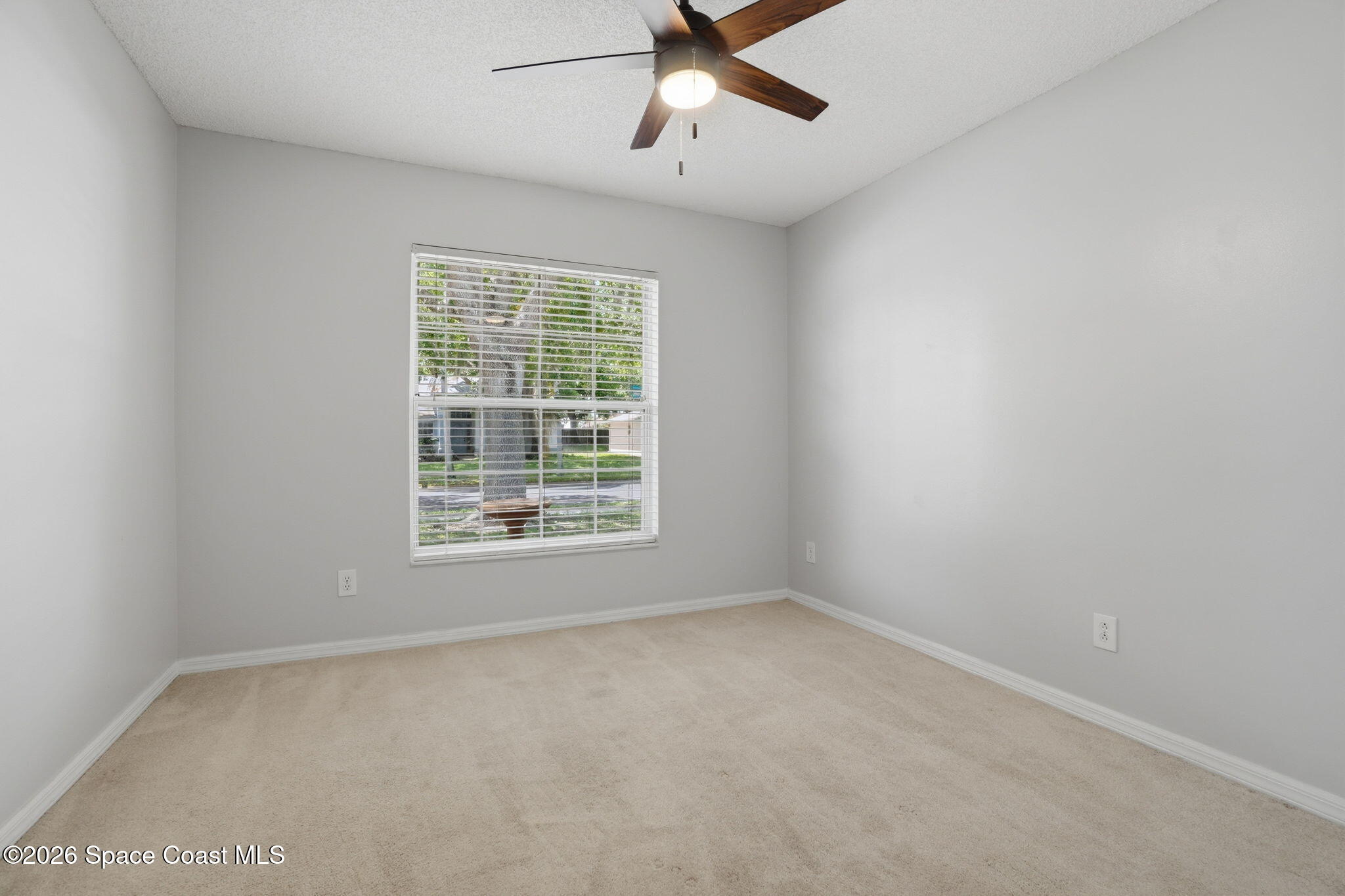 2005 Lansing Street Melbourne, FL 32935 - Photo 26 of 47 an empty room with a window