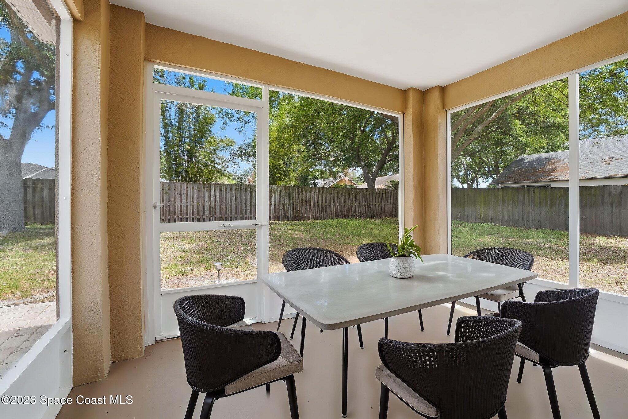 2005 Lansing Street Melbourne, FL 32935 - Photo 37 of 47 a view of a dining room with furniture window and outside view