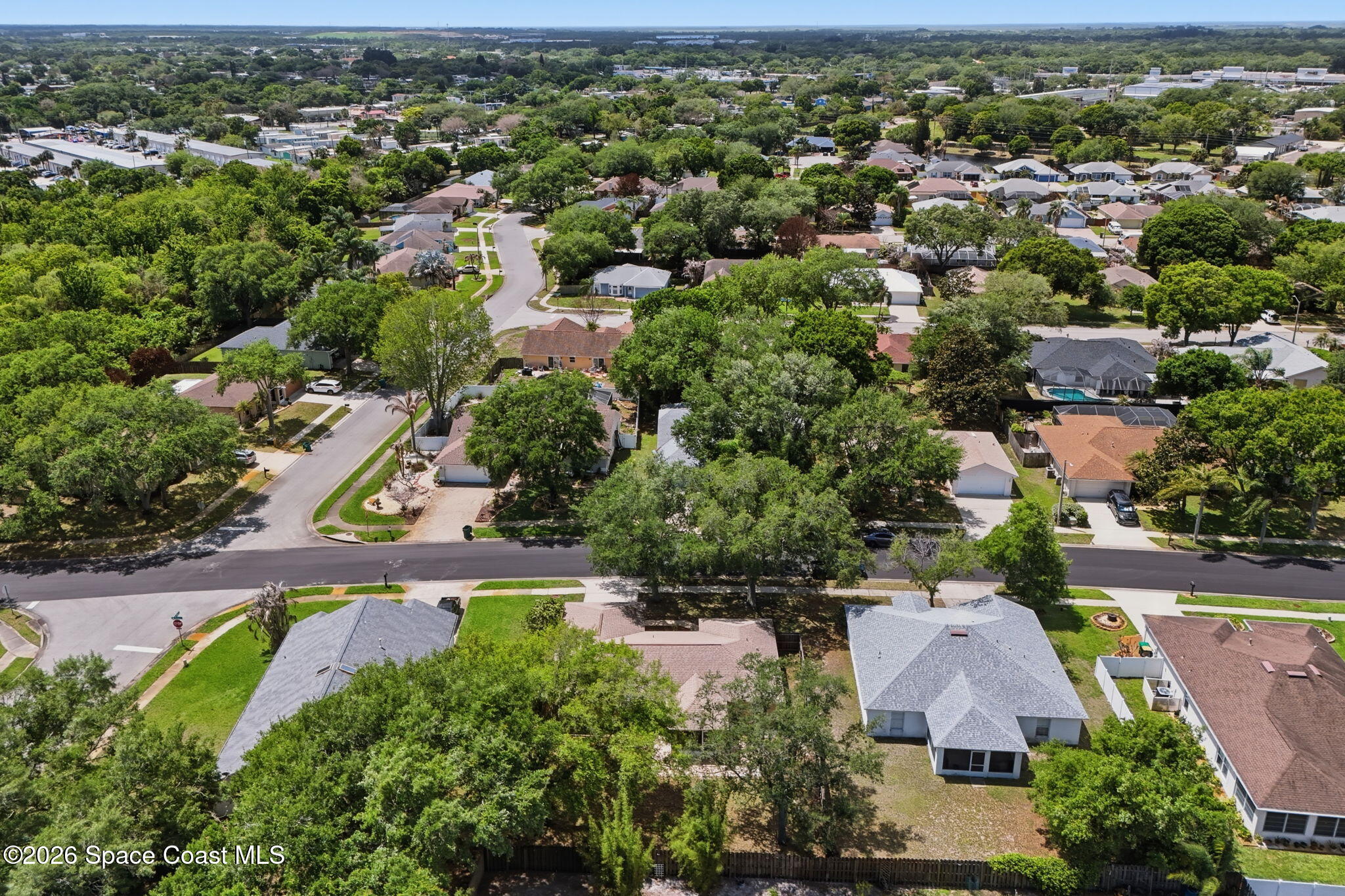 2005 Lansing Street Melbourne, FL 32935 - Photo 44 of 47 an aerial view of a city with lots of residential buildings