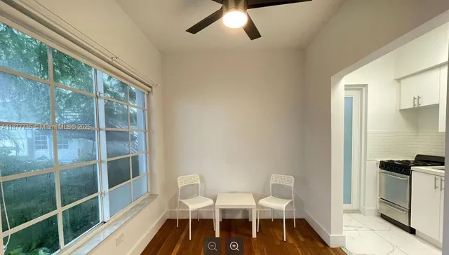 a bathroom with a sink and a window