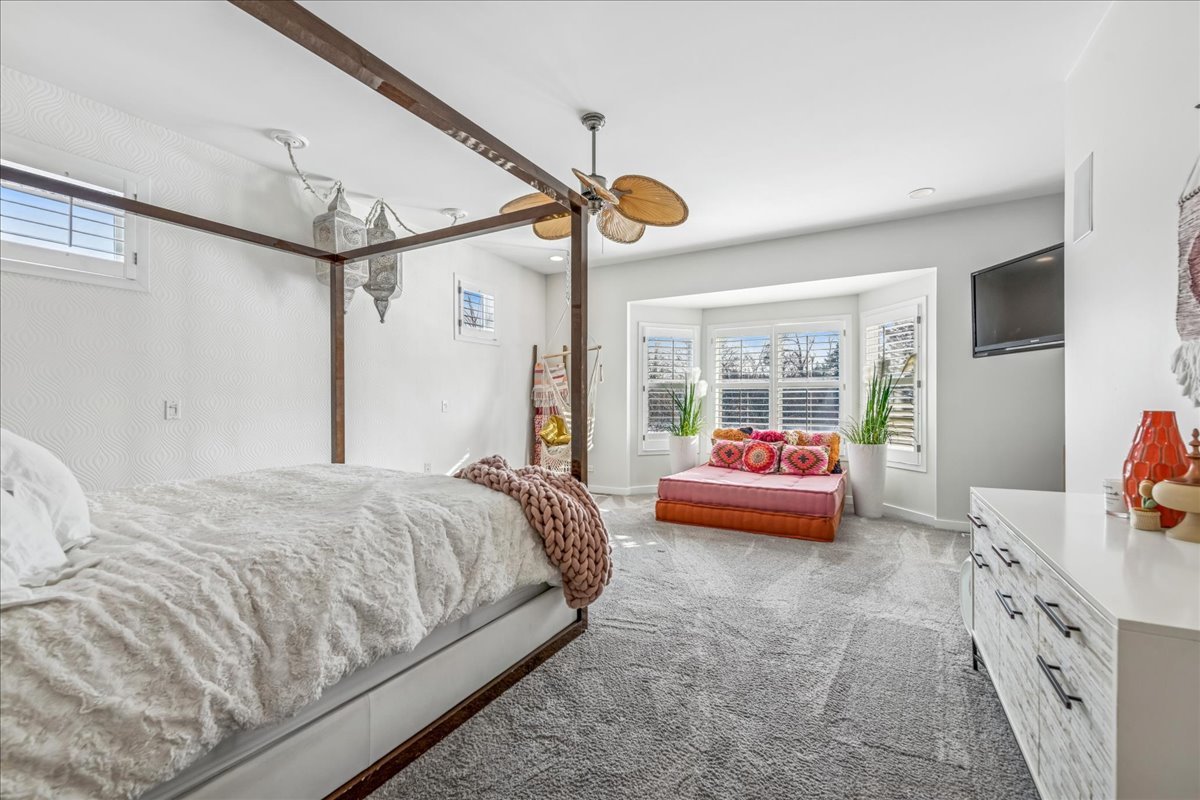 12 East Penny Road South Barrington, IL 60010 - Photo 19 of 61 a bedroom with bed and a chandelier