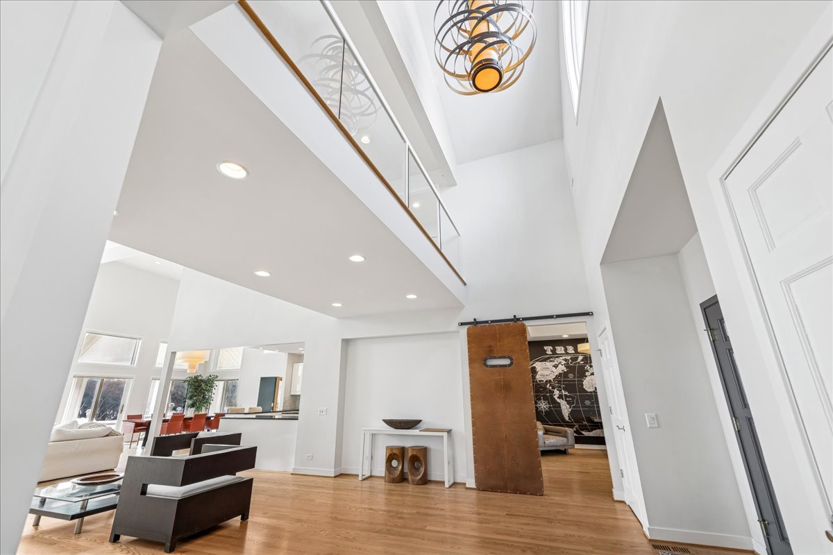12 East Penny Road South Barrington, IL 60010 - Photo 4 of 61 a view of a living room with furniture and wooden floor
