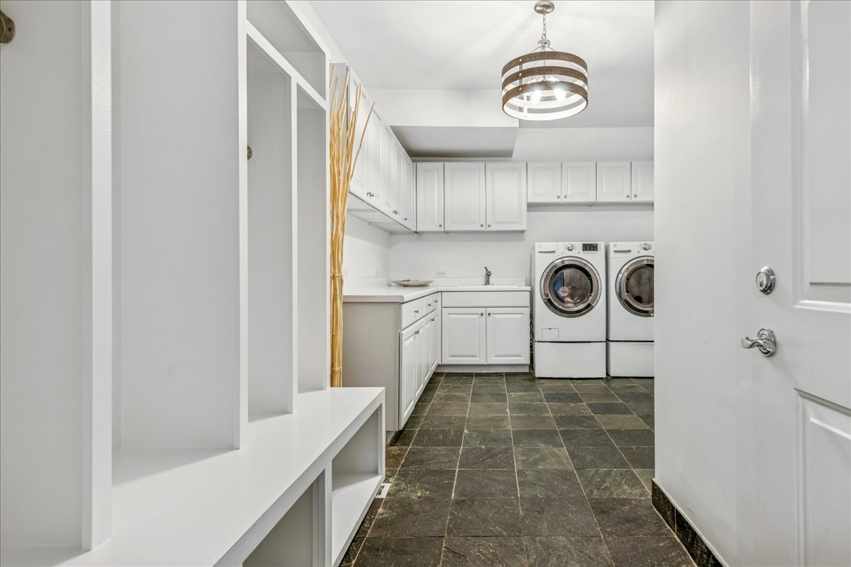 12 East Penny Road South Barrington, IL 60010 - Photo 44 of 61 a bathroom with a sink a mirror and a shower