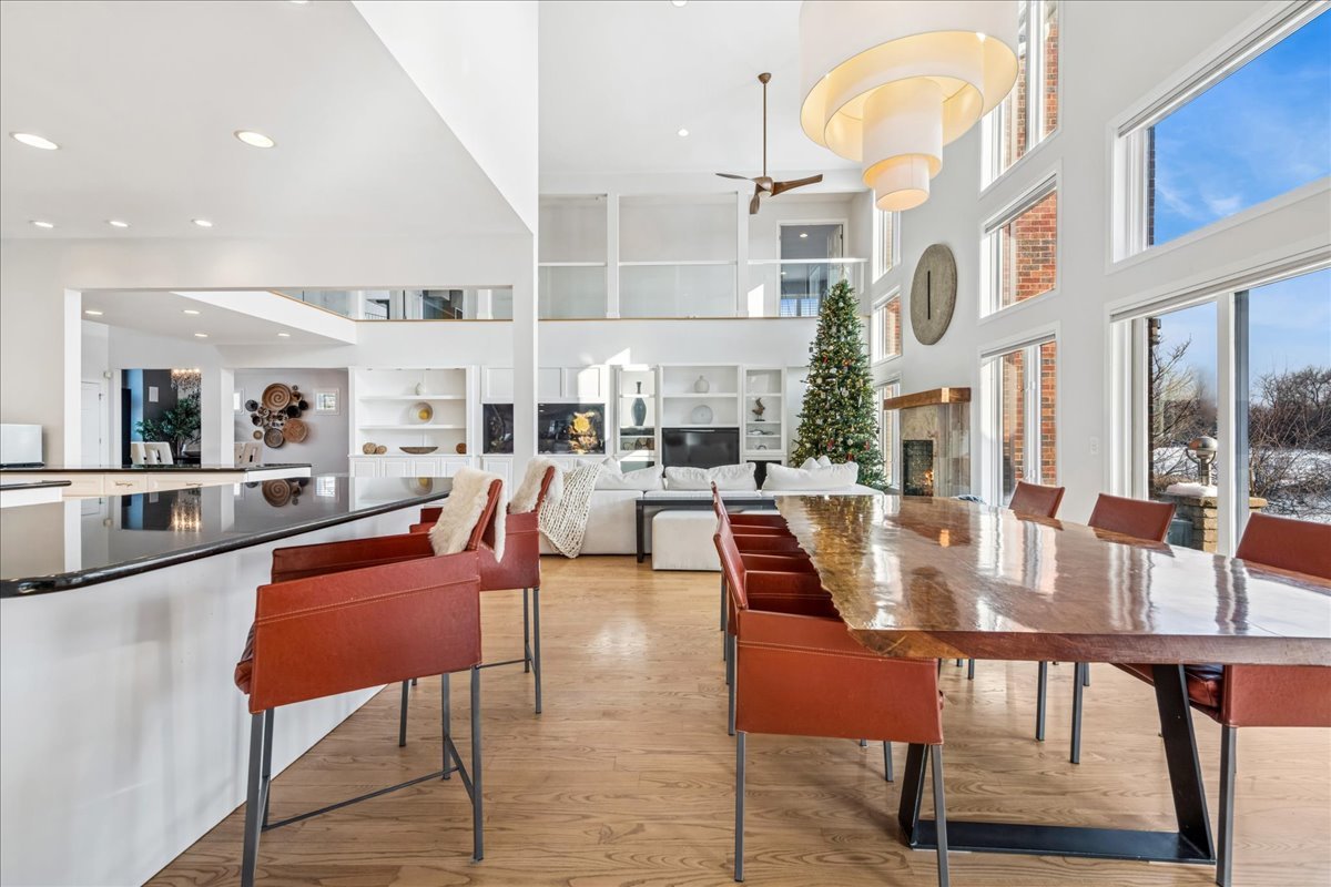 12 East Penny Road South Barrington, IL 60010 - Photo 10 of 61 a dining room with stainless steel appliances a table and chairs
