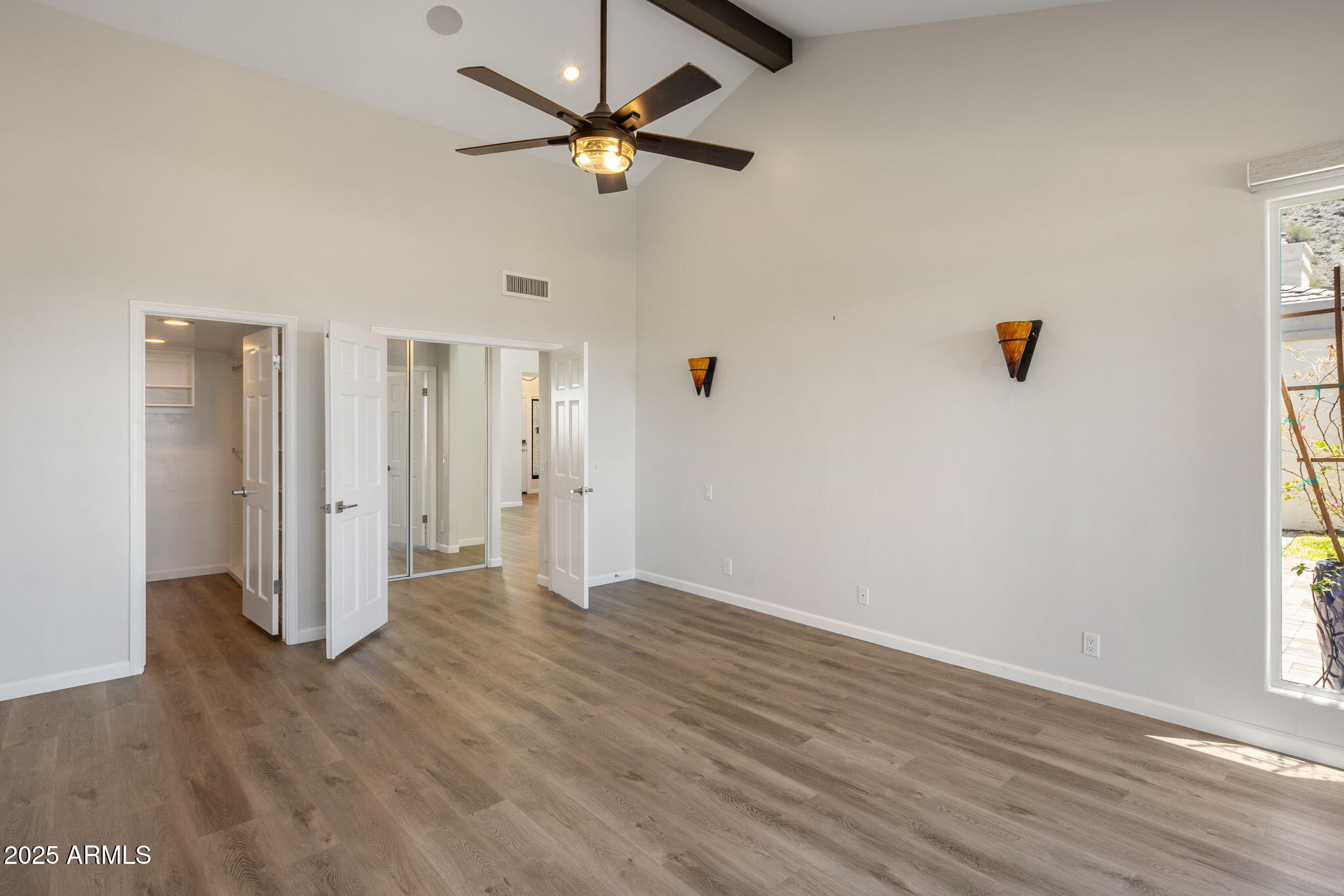 21 West Beryl Avenue Phoenix, AZ 85021 - Photo 13 of 35 wooden floor in an empty room with a window