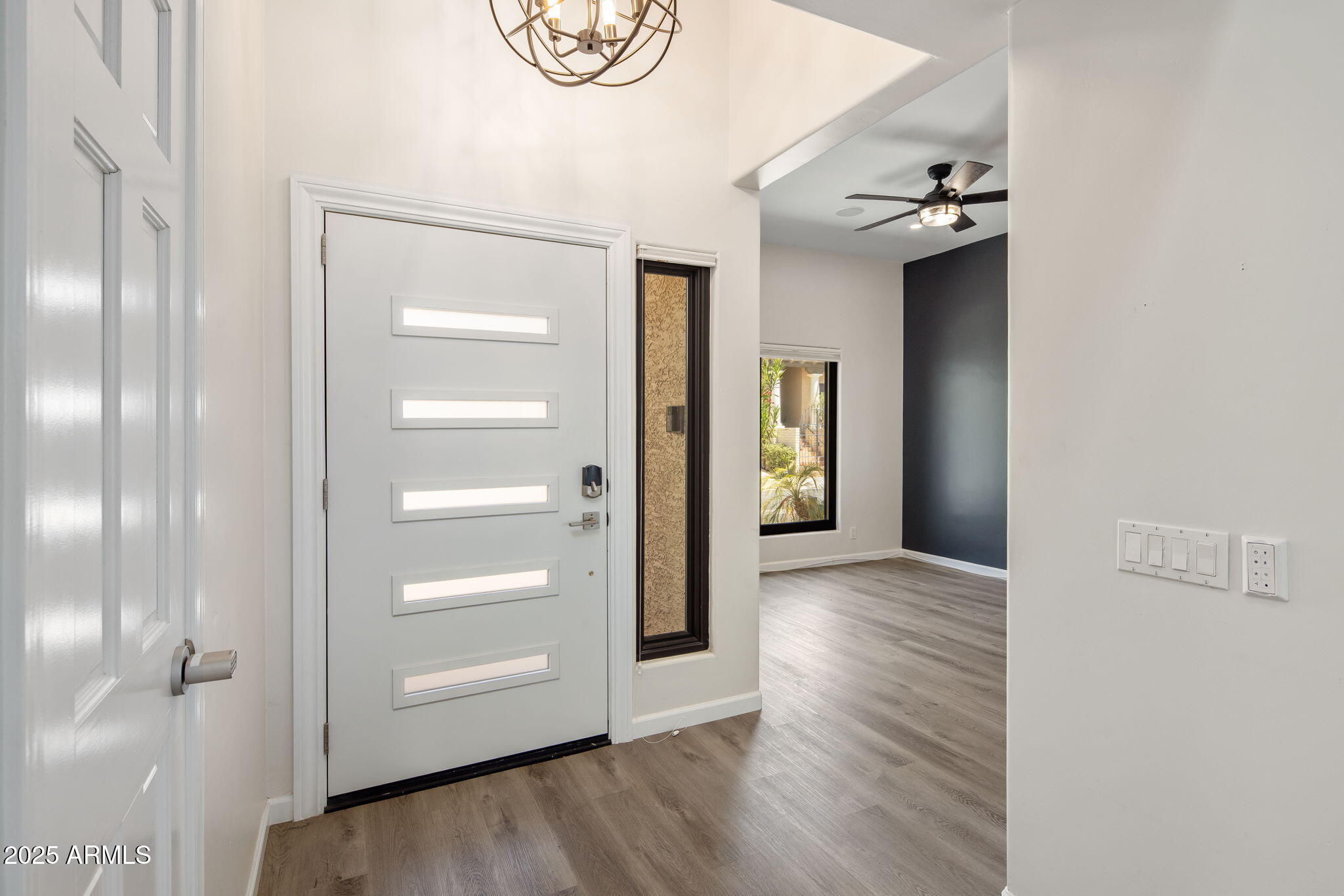 21 West Beryl Avenue Phoenix, AZ 85021 - Photo 3 of 35 a view of a room with wooden floor