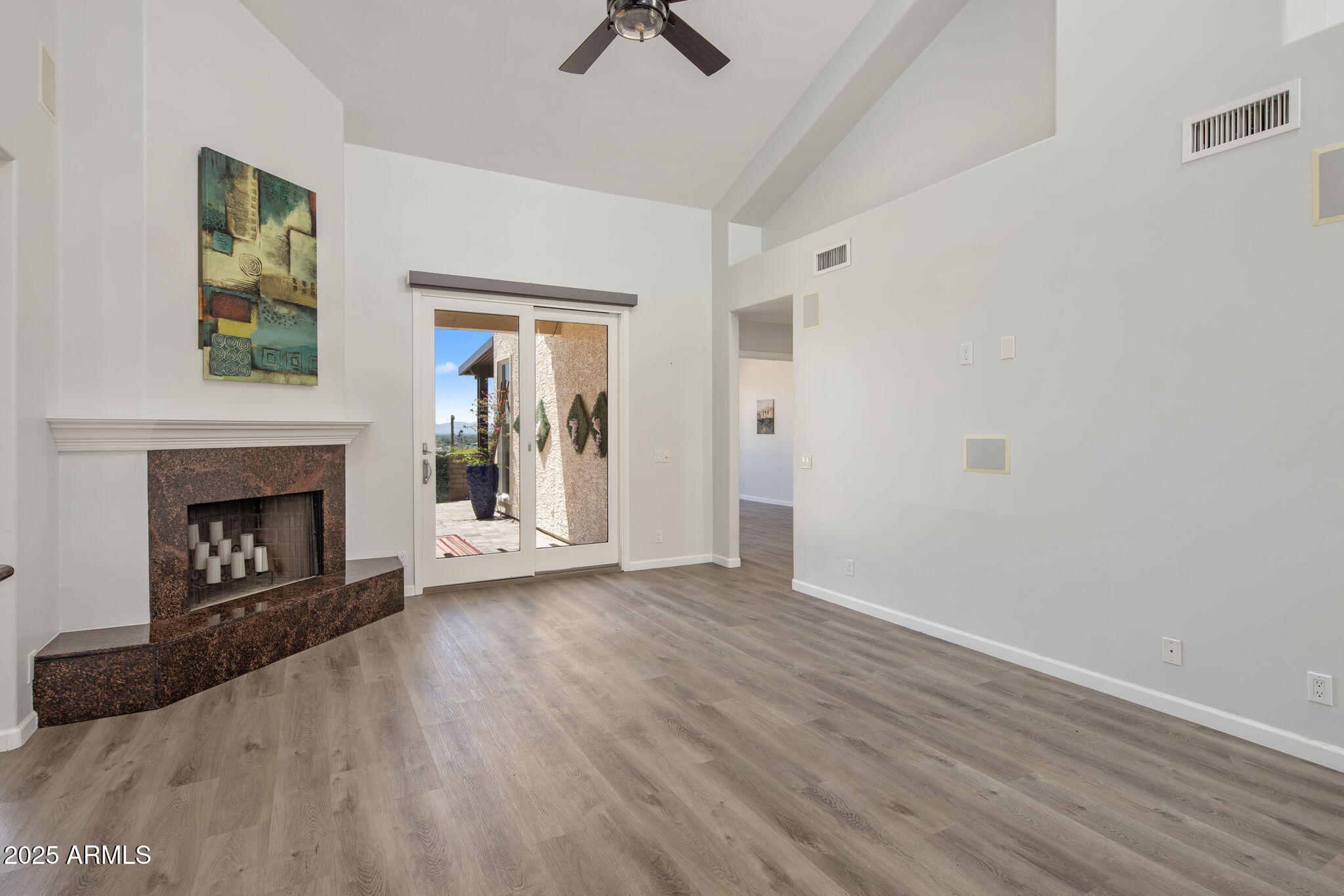 21 West Beryl Avenue Phoenix, AZ 85021 - Photo 6 of 35 a view of an empty room with window and fire place