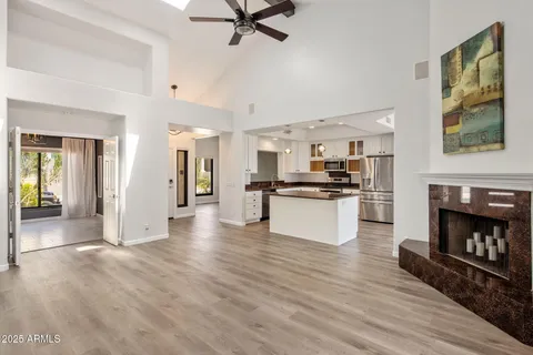 a view of kitchen with cabinets and wooden floor