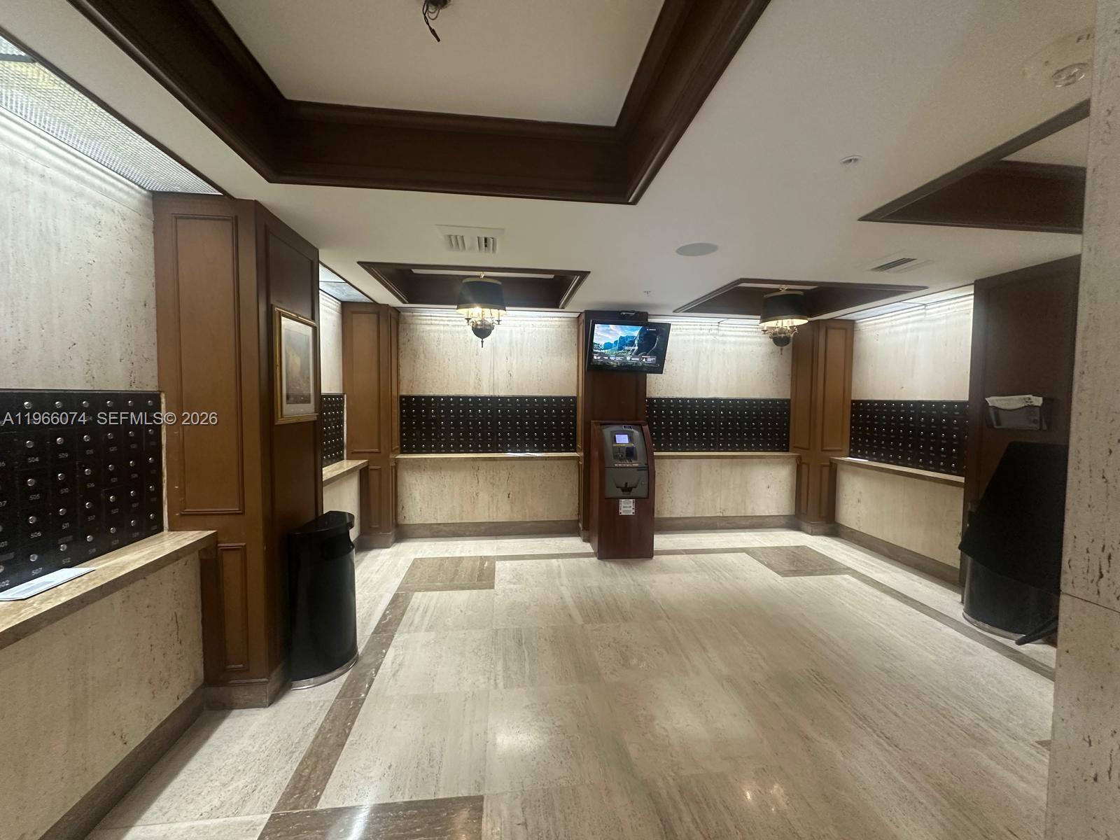 6039 Collins Avenue, Unit 1625 Miami Beach, FL 33140 - Photo 24 of 45 a view of a refrigerator in a kitchen