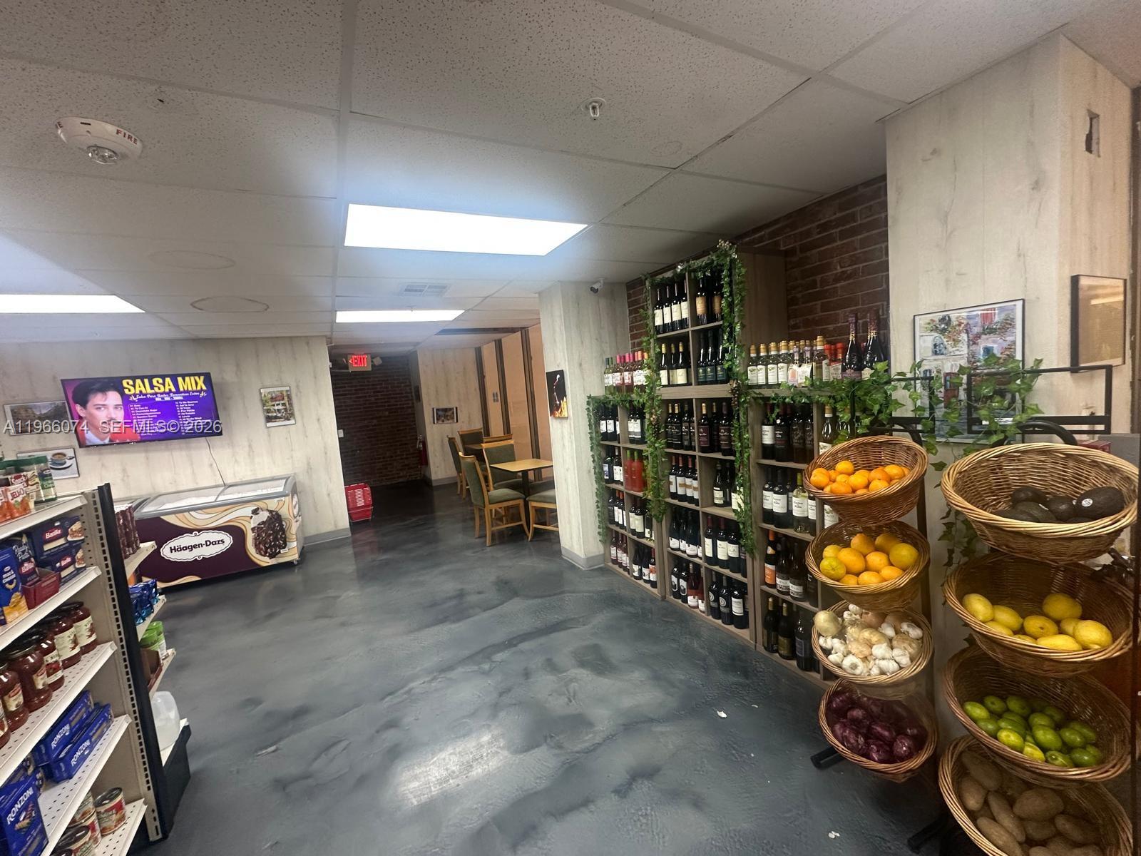 6039 Collins Avenue, Unit 1625 Miami Beach, FL 33140 - Photo 36 of 45 a view of a room with gym equipment