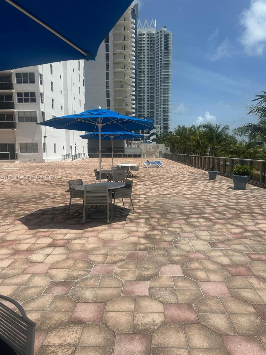 6039 Collins Avenue, Unit 1625 Miami Beach, FL 33140 - Photo 40 of 45 a view of outdoor space with seating area