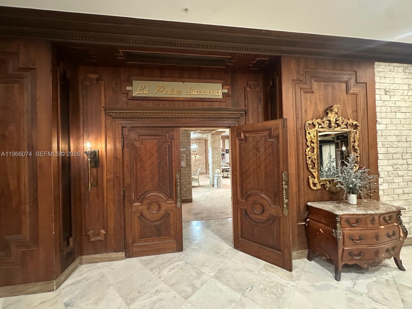 6039 Collins Avenue, Unit 1625 Miami Beach, FL 33140 - Photo 42 of 45 a view of an entryway door and an outdoor space