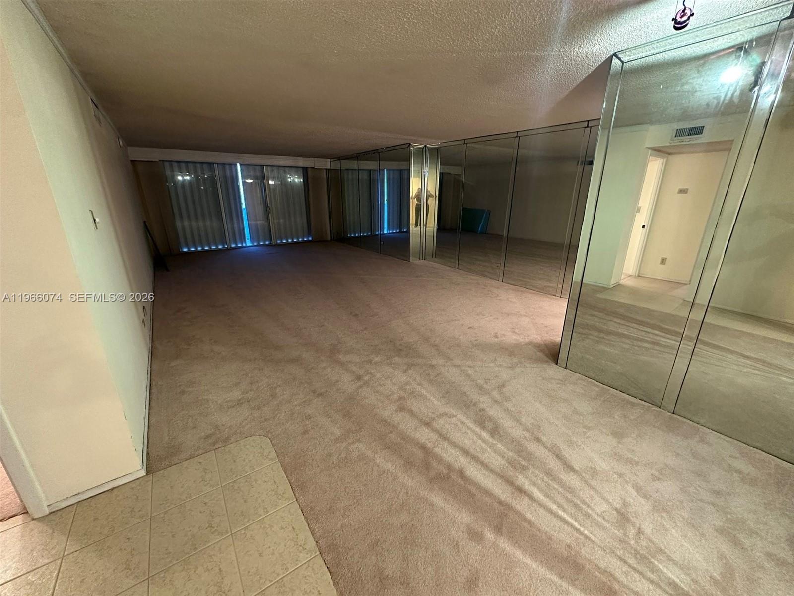 6039 Collins Avenue, Unit 1625 Miami Beach, FL 33140 - Photo 7 of 45 a view of an empty room