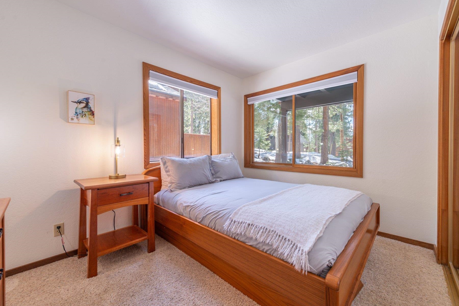 12317 Bennett Flat Road Truckee, CA 96161 - Photo 20 of 28 a bedroom with a bed and a window