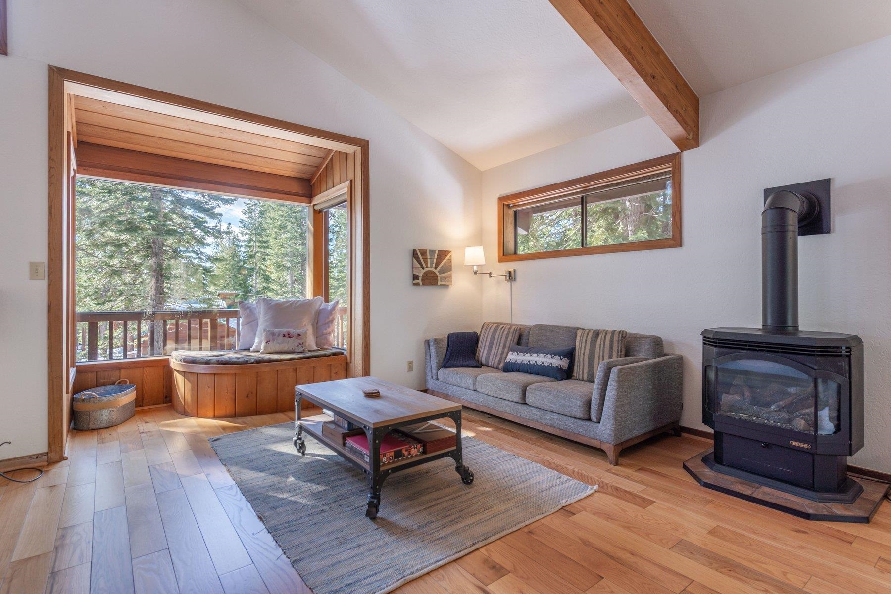 12317 Bennett Flat Road Truckee, CA 96161 - Photo 10 of 28 a living room with furniture and a wooden floor