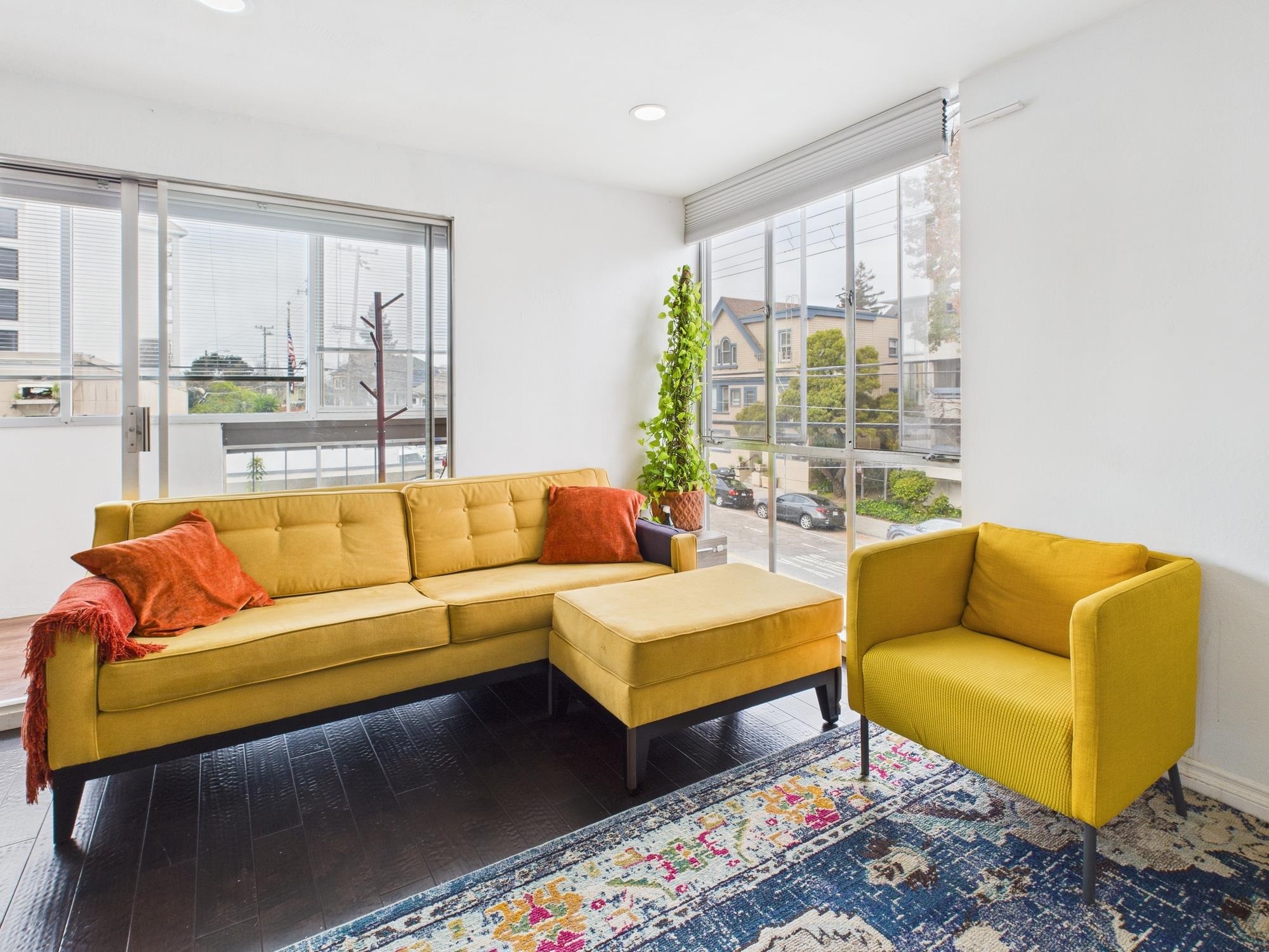 Living area featuring hardwood / wood-style floors, plenty of natural light, and recessed lighting