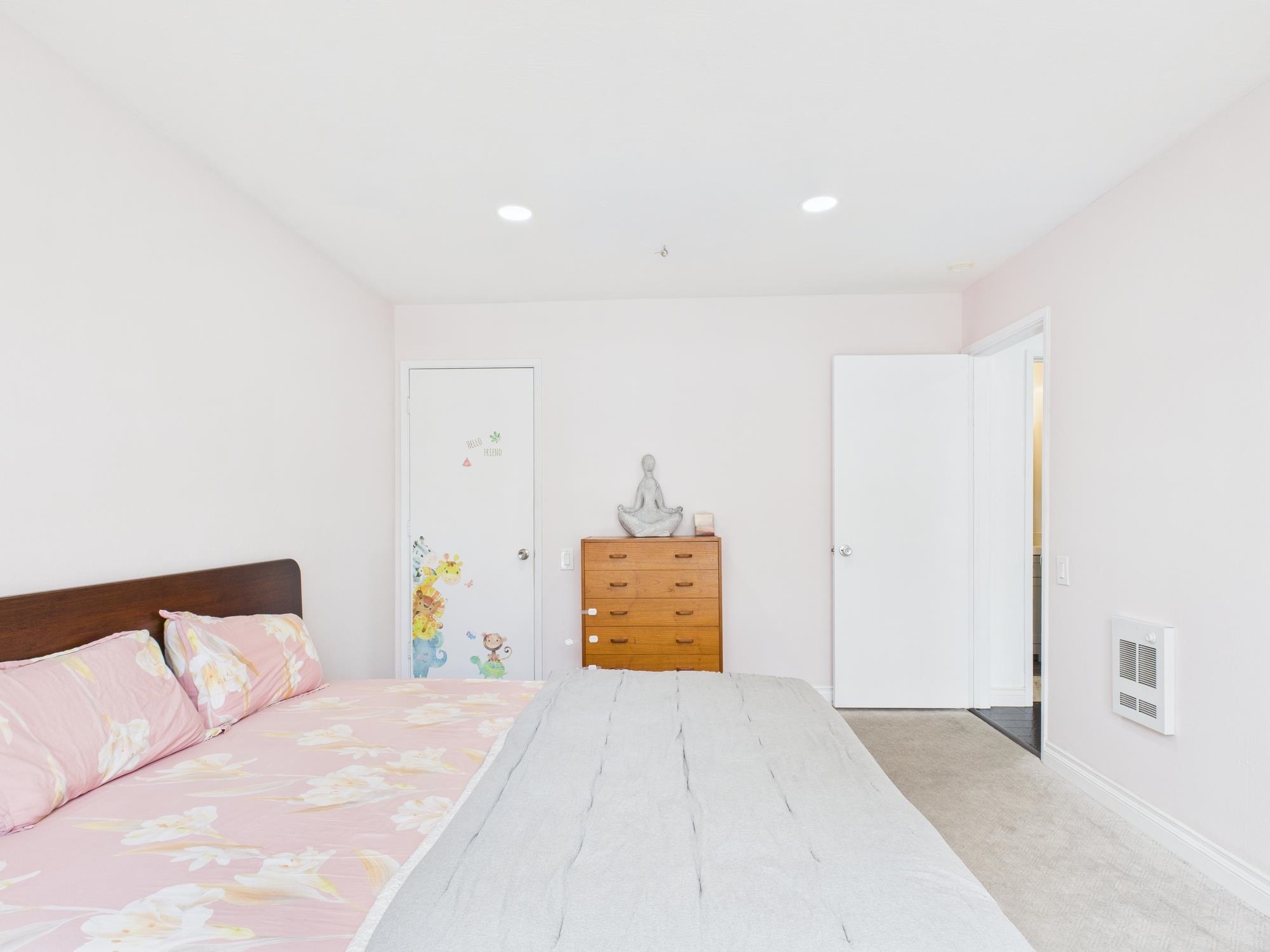 4099 Howe Street, Unit 202 Oakland, CA 94611 - Photo 19 of 19 Bedroom featuring recessed lighting, heating unit, and carpet