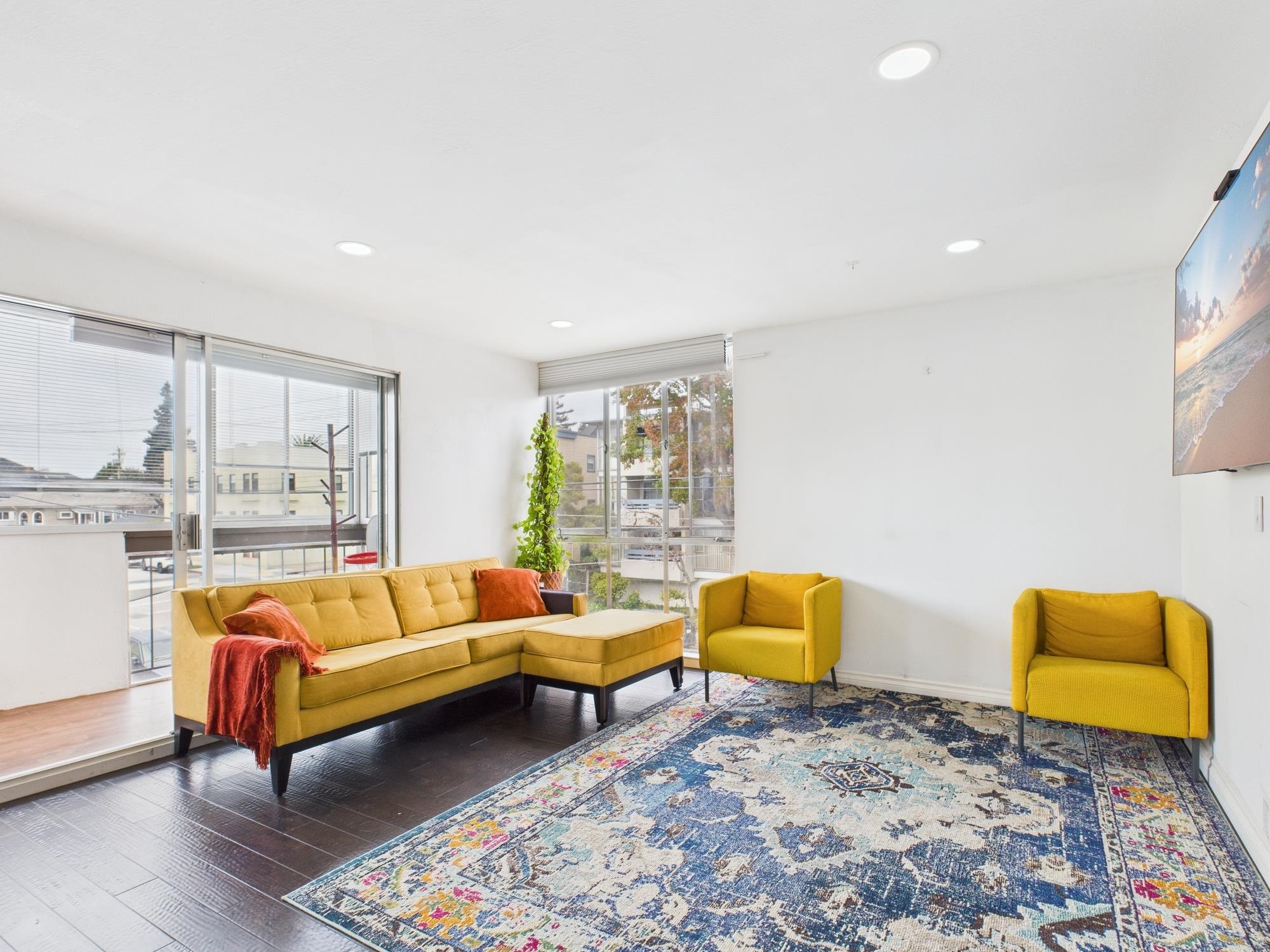 4099 Howe Street, Unit 202 Oakland, CA 94611 - Photo 4 of 19 Living room featuring recessed lighting and hardwood / wood-style floors