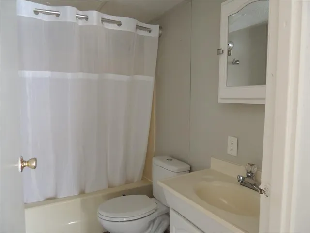 a view of a back yard of the house