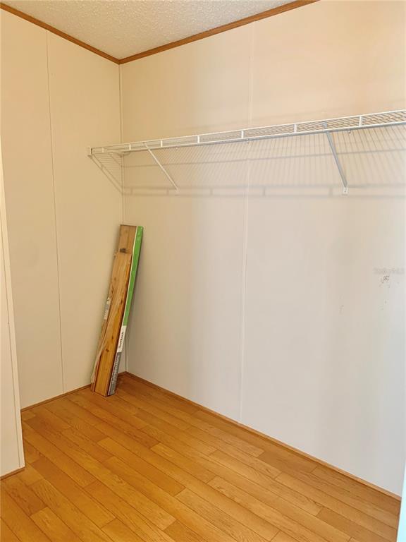 12752 Southeast 9th Place Gainesville, FL 32641 - Photo 23 of 53 a view of a room with wooden floor