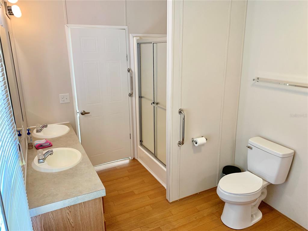 12752 Southeast 9th Place Gainesville, FL 32641 - Photo 26 of 53 a bathroom with a sink toilet and shower