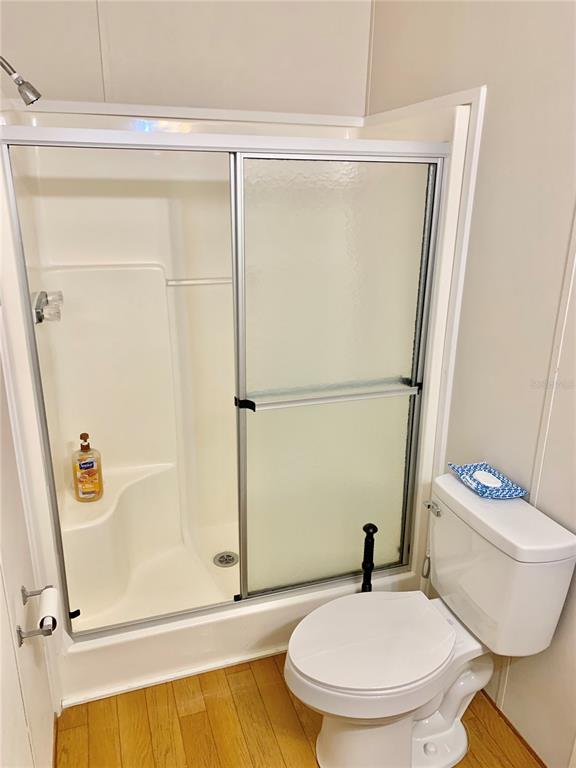 12752 Southeast 9th Place Gainesville, FL 32641 - Photo 32 of 53 a bathroom with a toilet and a shower