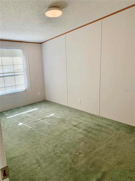 12752 Southeast 9th Place Gainesville, FL 32641 - Photo 33 of 53 a view of an empty room with a window