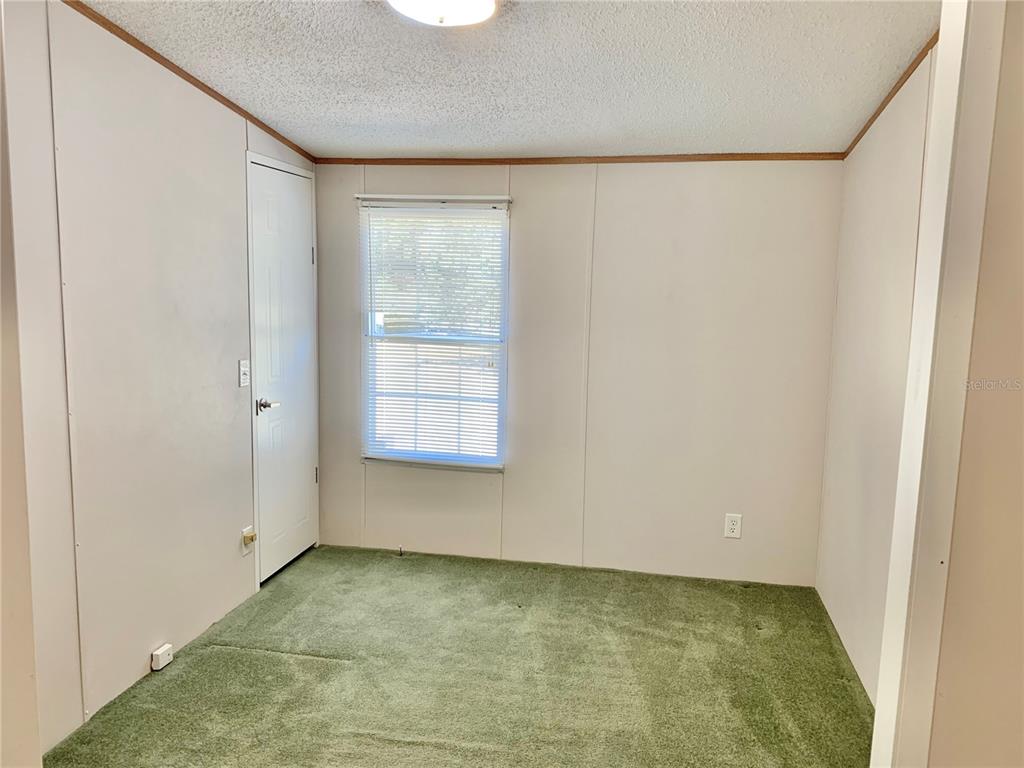 12752 Southeast 9th Place Gainesville, FL 32641 - Photo 41 of 53 a view of an empty room with a window