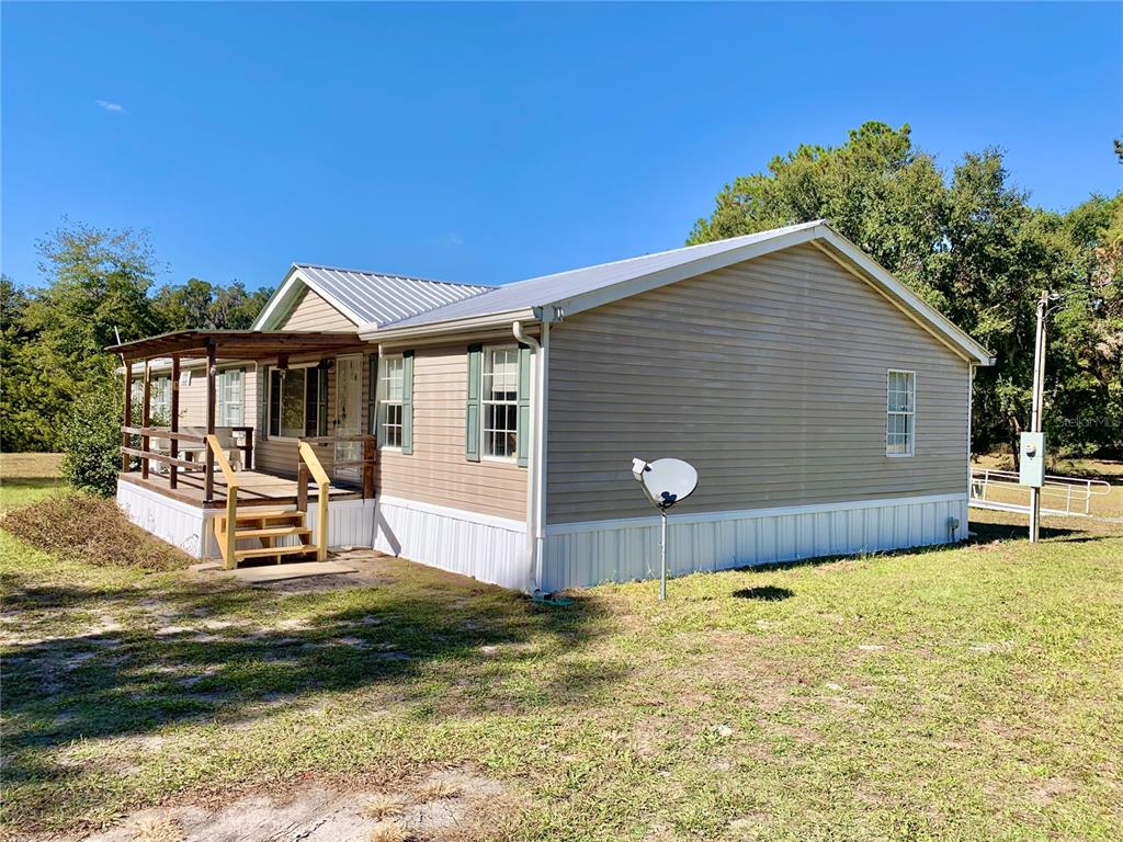 12752 Southeast 9th Place Gainesville, FL 32641 - Photo 46 of 53 a front view of a house with garden