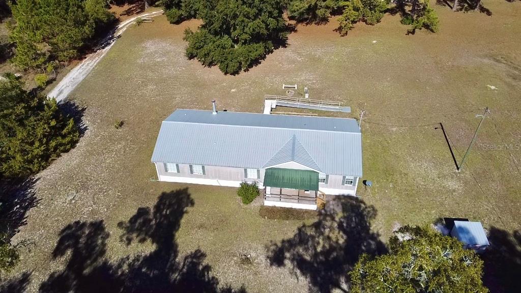 12752 Southeast 9th Place Gainesville, FL 32641 - Photo 52 of 53 an aerial view of a house with a yard