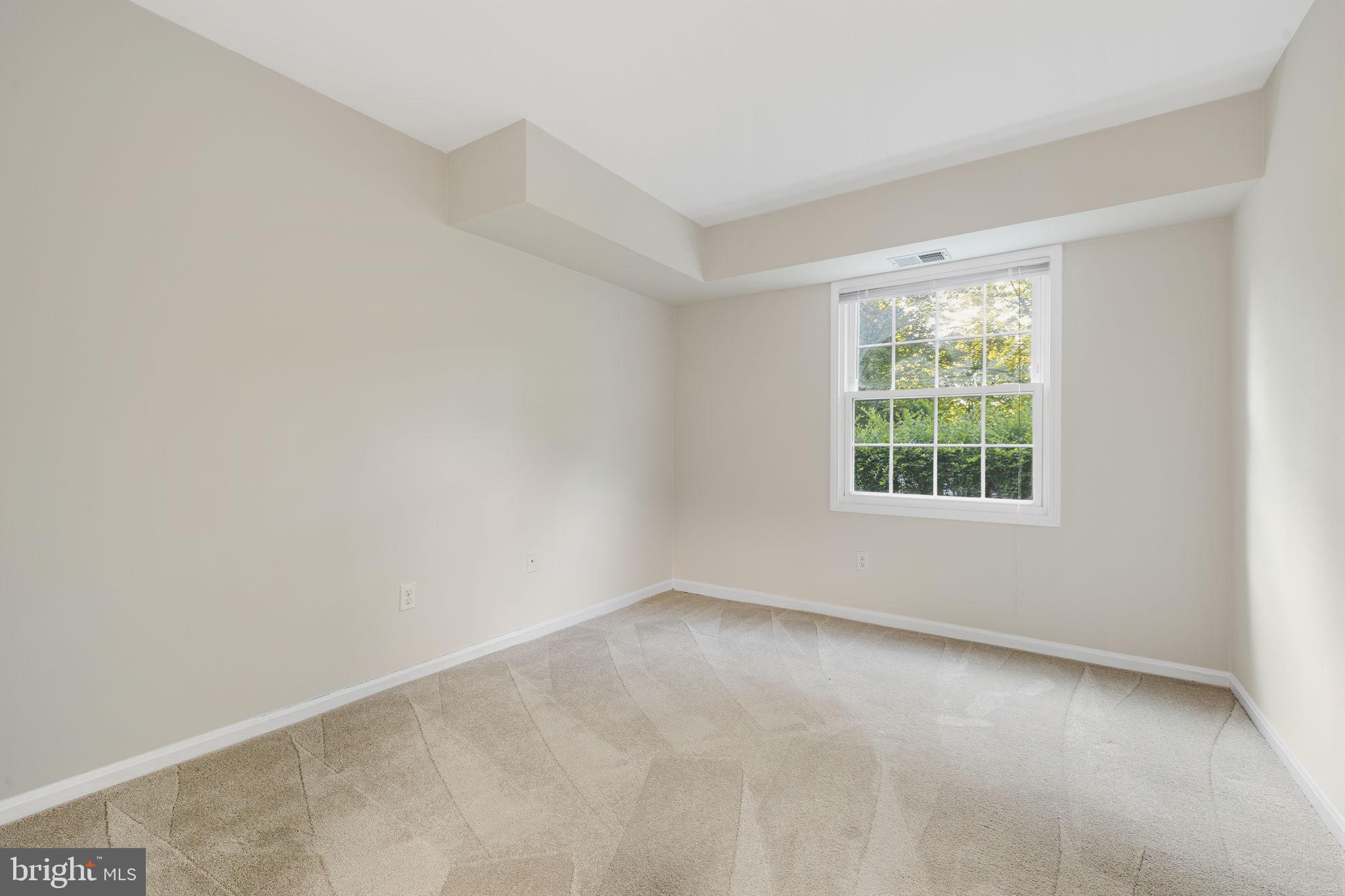 5817 Rexford Drive, Unit 798 Springfield, VA 22152 - Photo 10 of 23 an empty room with a window