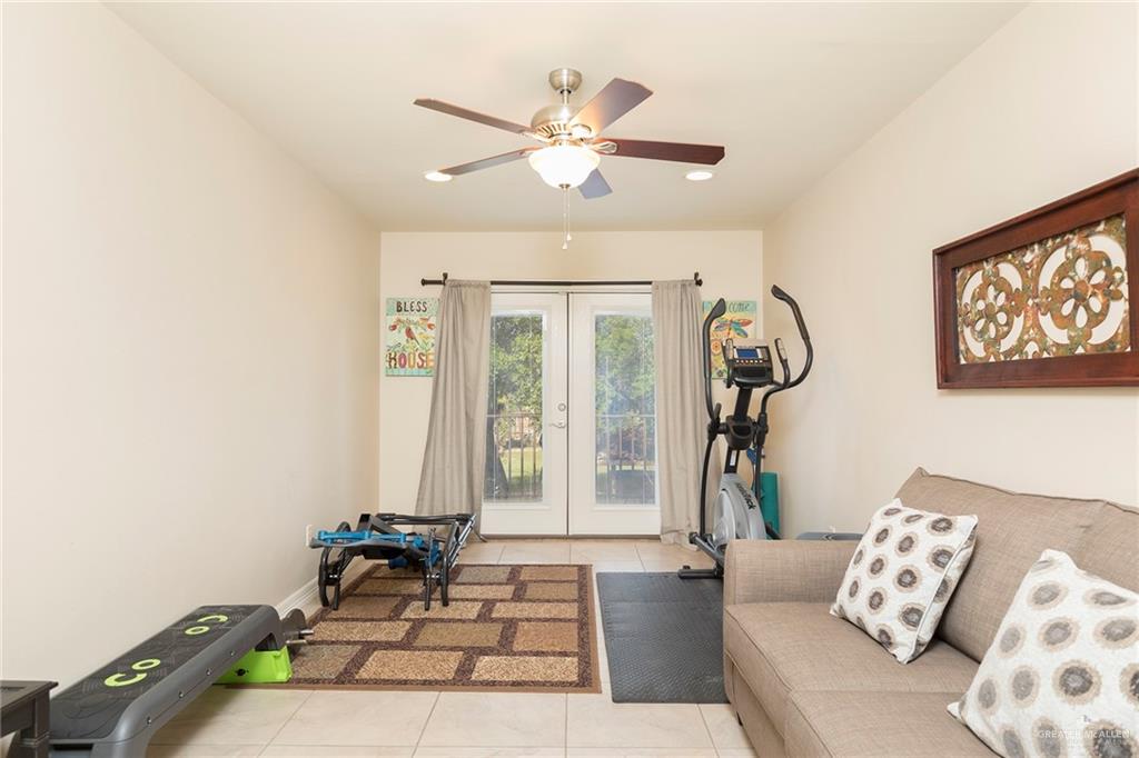 605 South Hutto Road Donna, TX 78537 - Photo 18 of 45 A second-floor bonus room is currently being utilized as an exercise room. It can easily be modified to flex as a nursery, office or hobby room. The french doors open up to a private balcony.