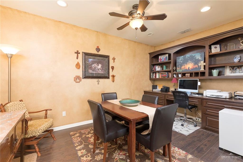 605 South Hutto Road Donna, TX 78537 - Photo 6 of 45 This flex space offers endless possibilities to be staged as you like. The built-ins add interest, storage and dimension to the room.