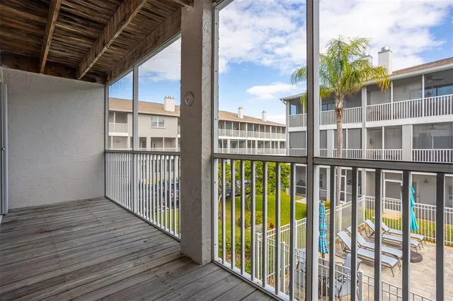 a spacious bathroom with a double vanity sink a toilet and a mirror
