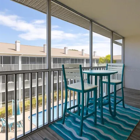 a view of empty room with windows