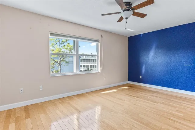 a view of a hallway with stairs