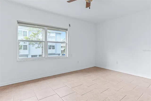 an aerial view of a city with ocean view