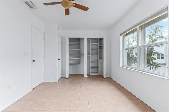 an aerial view of a city with ocean view