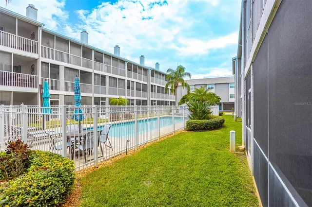 a view of a tall building from a balcony
