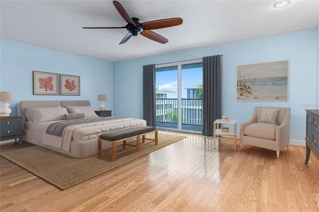 an aerial view of a house with a ocean view
