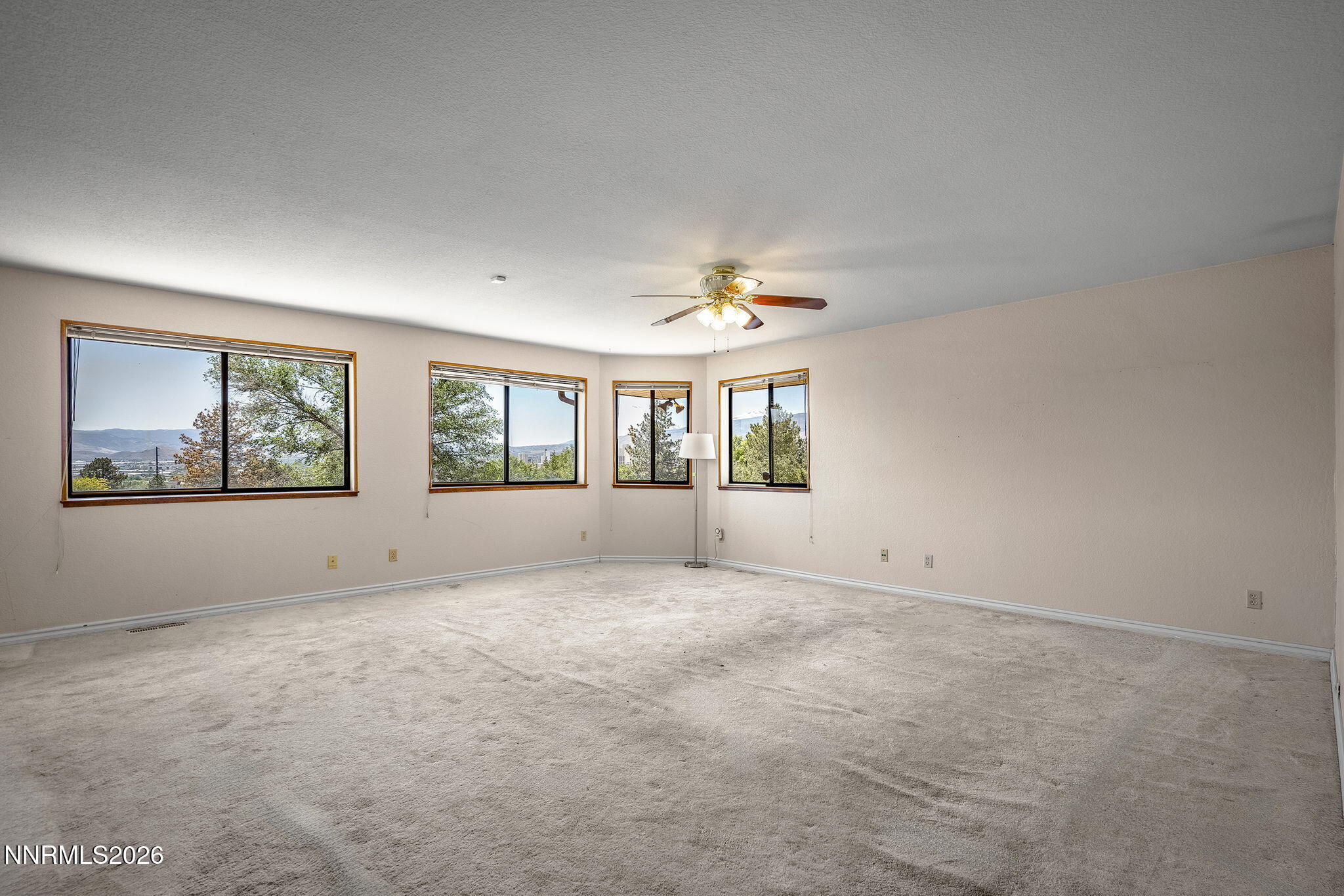 2985 Socrates Drive Reno, NV 89512 - Photo 45 of 52 a view of an empty room with a window