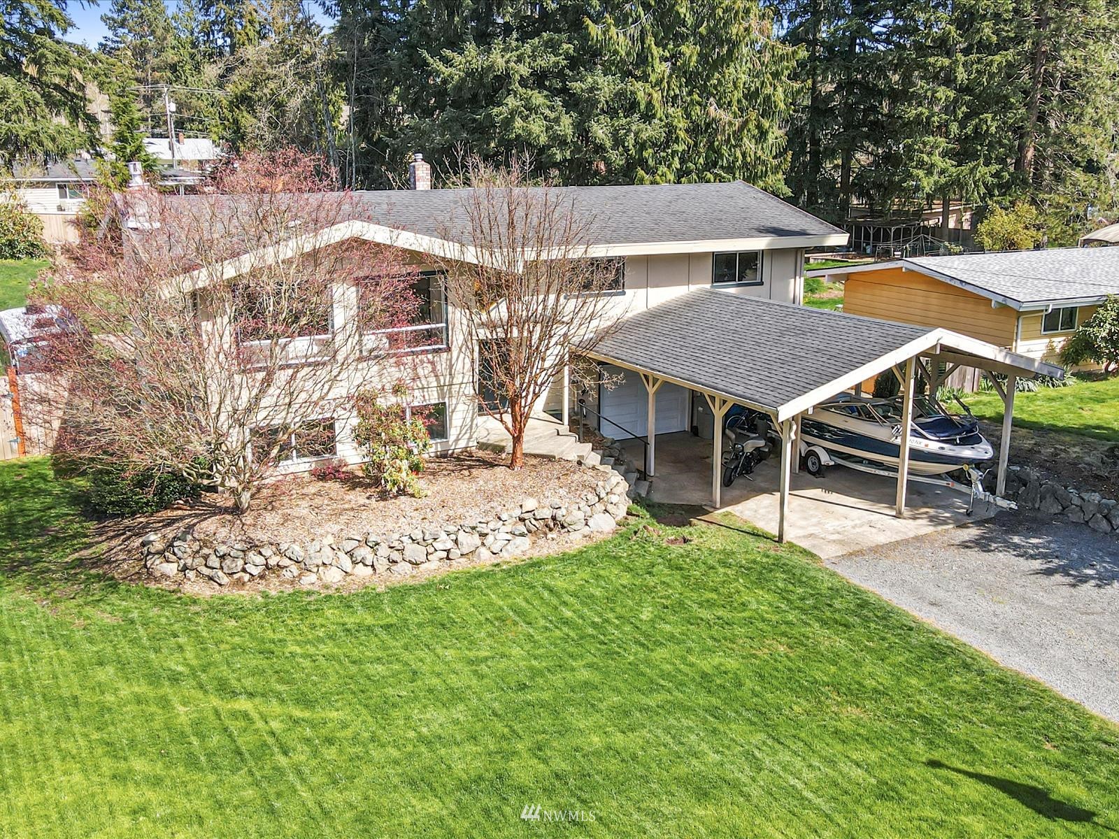 17320 Southeast 135th Street Renton, WA 98059 - Photo 1 of 28 a view of a house with a yard and sitting area