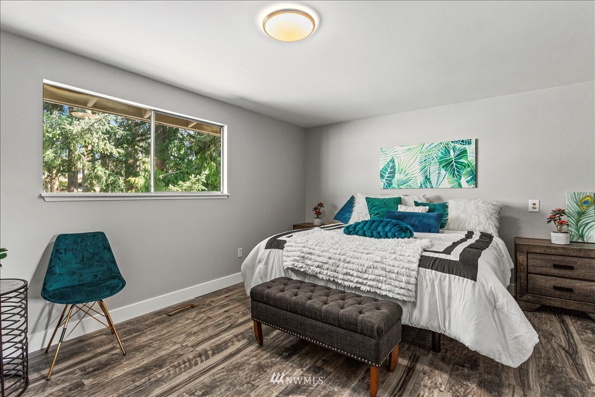 17320 Southeast 135th Street Renton, WA 98059 - Photo 16 of 28 a bedroom with furniture and a window