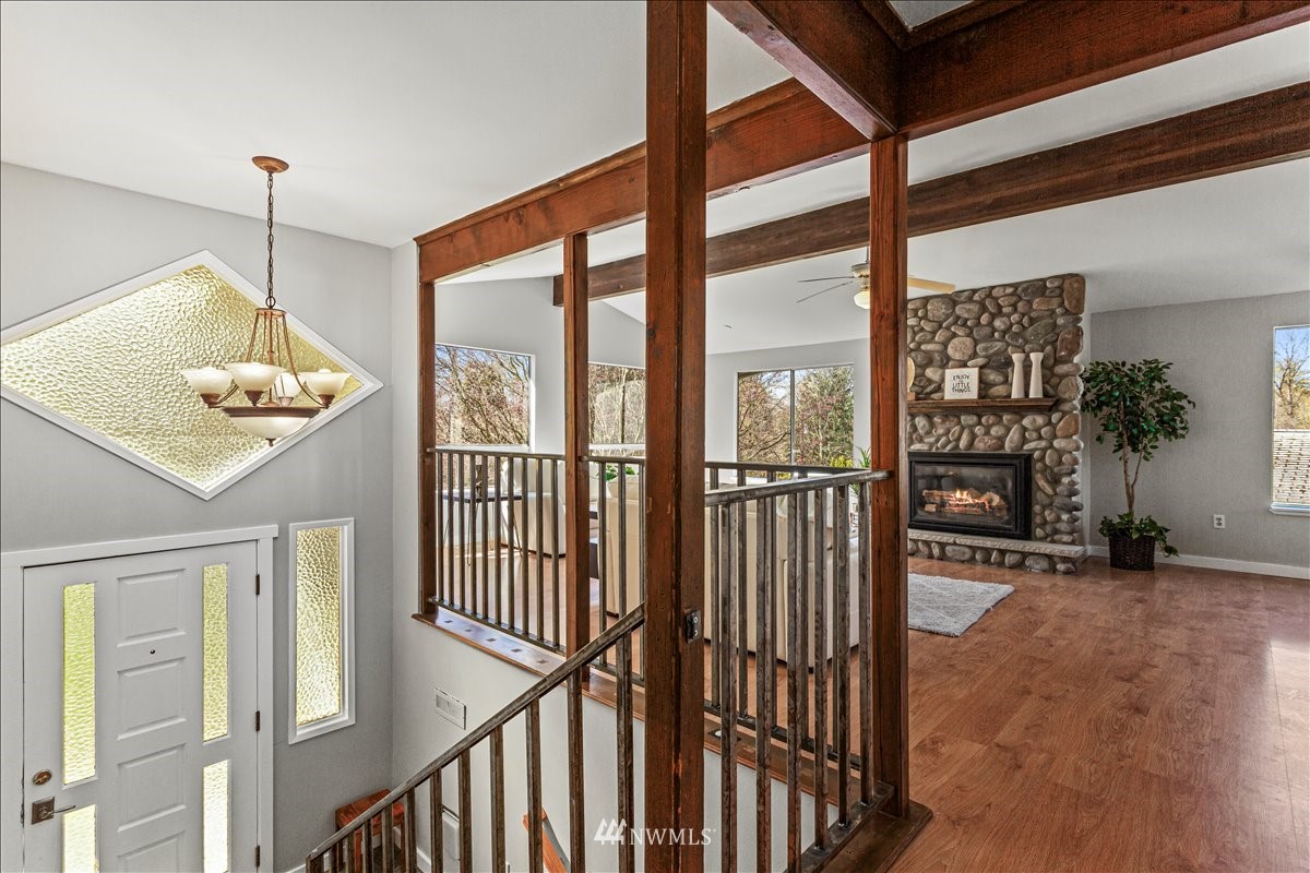 17320 Southeast 135th Street Renton, WA 98059 - Photo 3 of 28 a view of an entryway with wooden floor