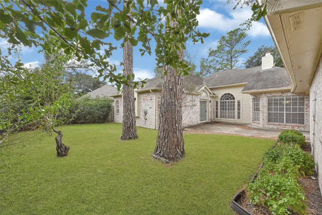 a house view with a garden space